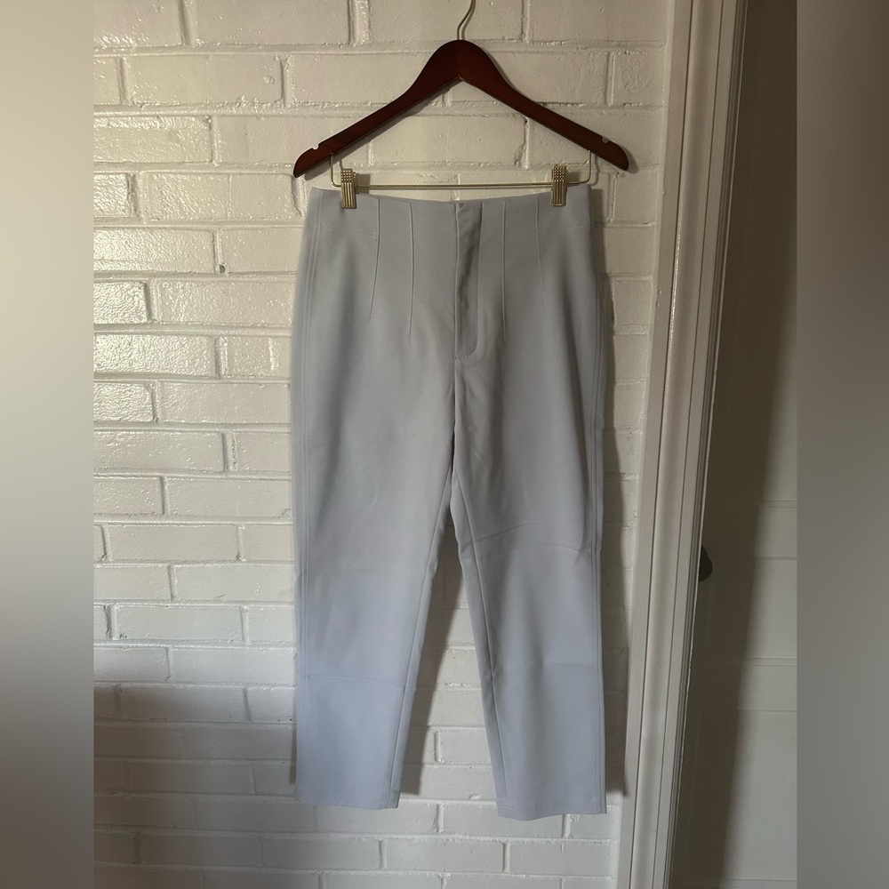 Light blue cropped trousers. Size M